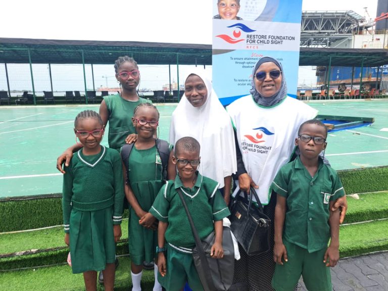 Dr. Halima L. Alimi, Executive Director Restore Foundation with Some Recipients from Command Primary School.