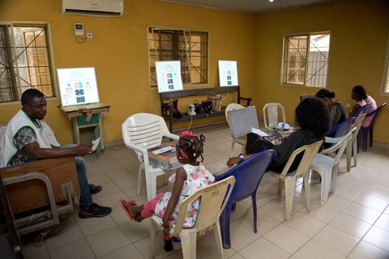 TeamRestore Doing Vision Screening Tests_