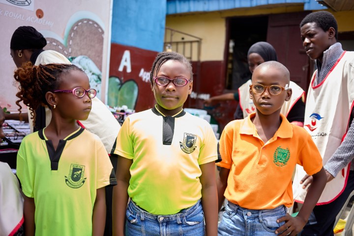 Free Glasses Recipients Trying them Out