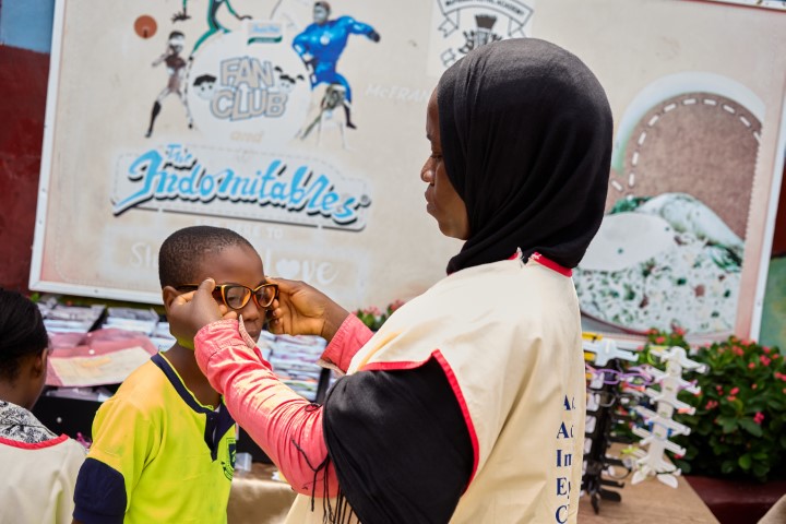 Potential Glasses Recipient being fitted