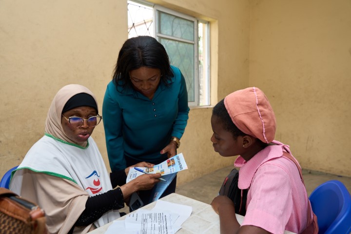 Dr. Akinremi Attending to Participants