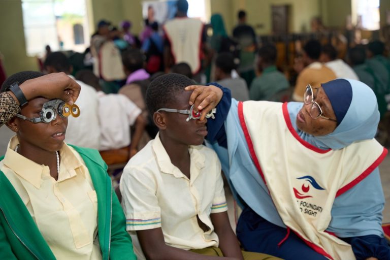 Dr. Akinremi Working with Students