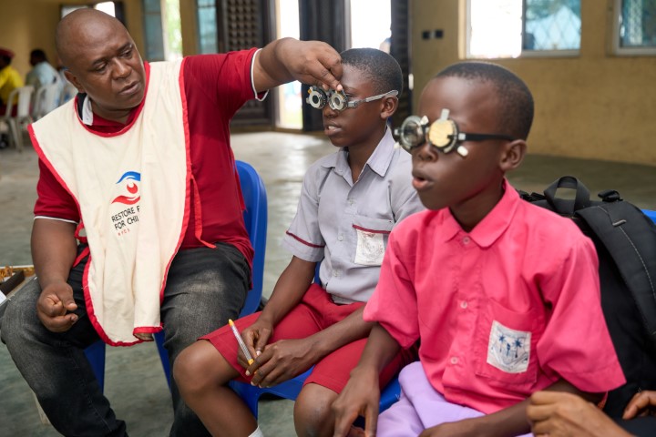 Optometrists Conducting Screening
