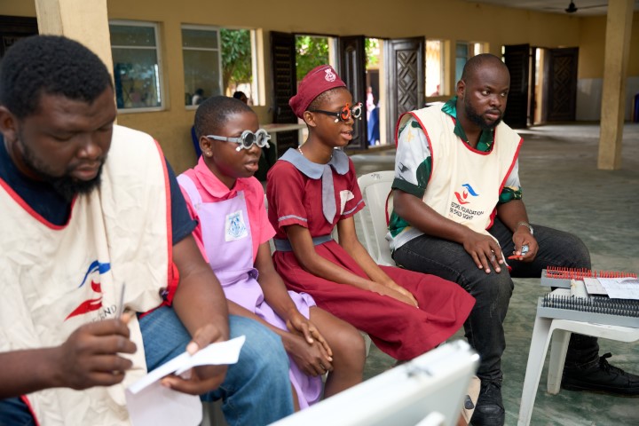 Optometrists Screening Students
