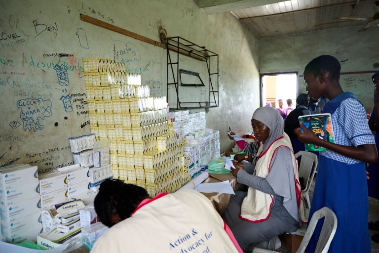 Student At The Medicine Station