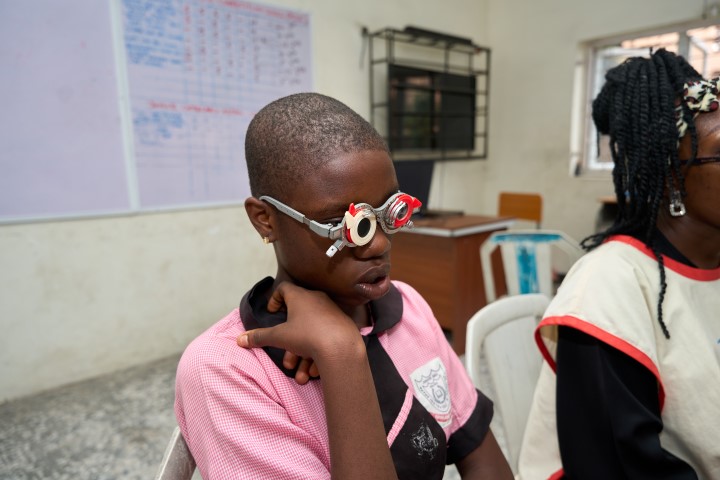 Student Being Screened By The Optometrist