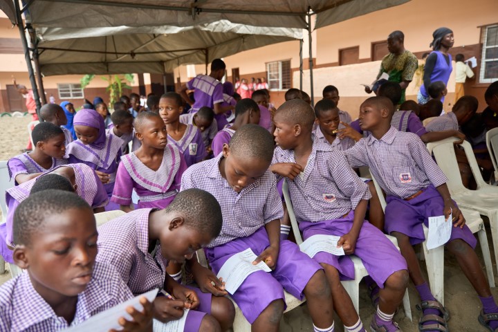 Students Filling Out Registration Slips